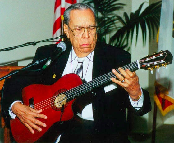 Inaugural Ceremony of the Lalo Guerrero collection, December 4, 2000 Guerrero playing guitar, 2000