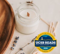 UCSB Reads 2026 Badge superimposed over an image of an unlit candle in a glass jar with matches and lavender. 