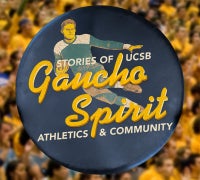 A round leather tire cover with an illustration of a football player and the words Gaucho Spirit Stories of UCSB Athletics & Community over a background of cheering UCSB fans in gold shirts.