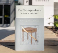 Copy of "Correspondence Volume 3" in front of UCSB Library's Paseo West entrance.